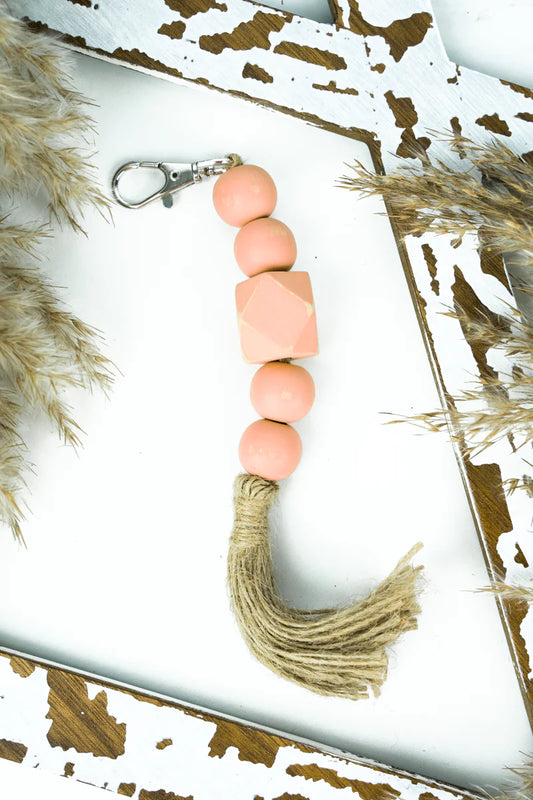 PEACH WOOD BEADS AND JUTE TASSEL CLIP